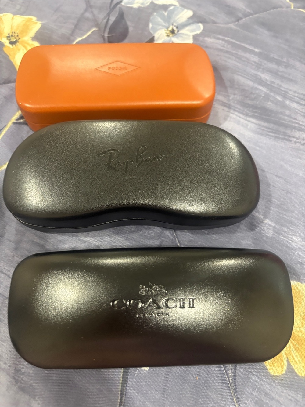 coach,ray ban,fossil glasses cases